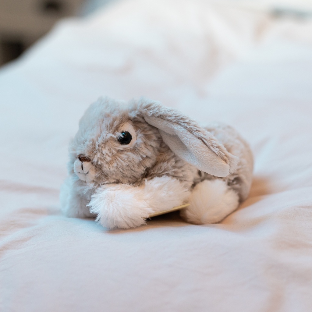Peluche Lapin doux allongé 14 cm