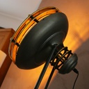 Lampe sur trepied en métal vieilli façon projecteur